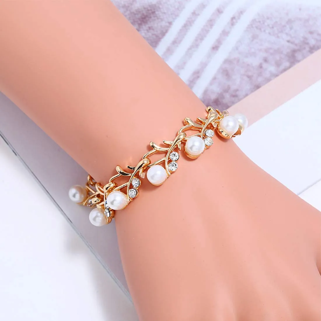 Yellow Chimes Celebrity Choice Classic Adorable Water Pearls Crystals Gold Plated Bracelet for Women and Girls